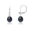 une paire de boucles d’oreilles en perles noires
