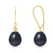 une paire de boucles d’oreilles en perles noires