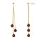 une paire de boucles d’oreilles or et marron