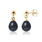 une paire de boucles d’oreilles en perles noires