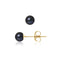 une paire de boucles d’oreilles en perles noires