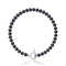 un bracelet en perles noires avec un fermoir en argent