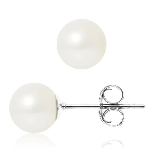 une paire de boucles d’oreilles en perles blanches