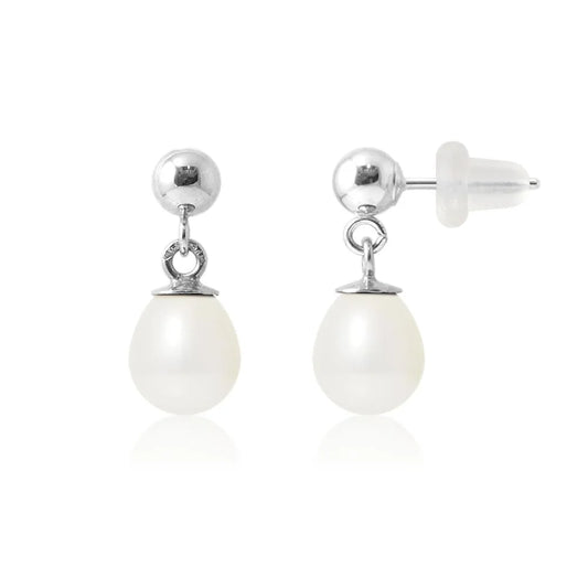 une paire de boucles d’oreilles en perles blanches