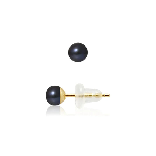 une paire de boucles d’oreilles en perles noires et or
