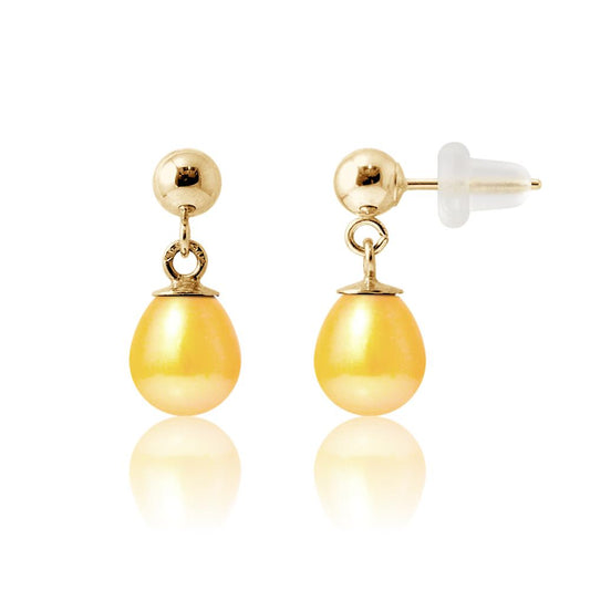 une paire de boucles d’oreilles en perles jaunes