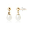 une paire de boucles d’oreilles en or et perles blanches