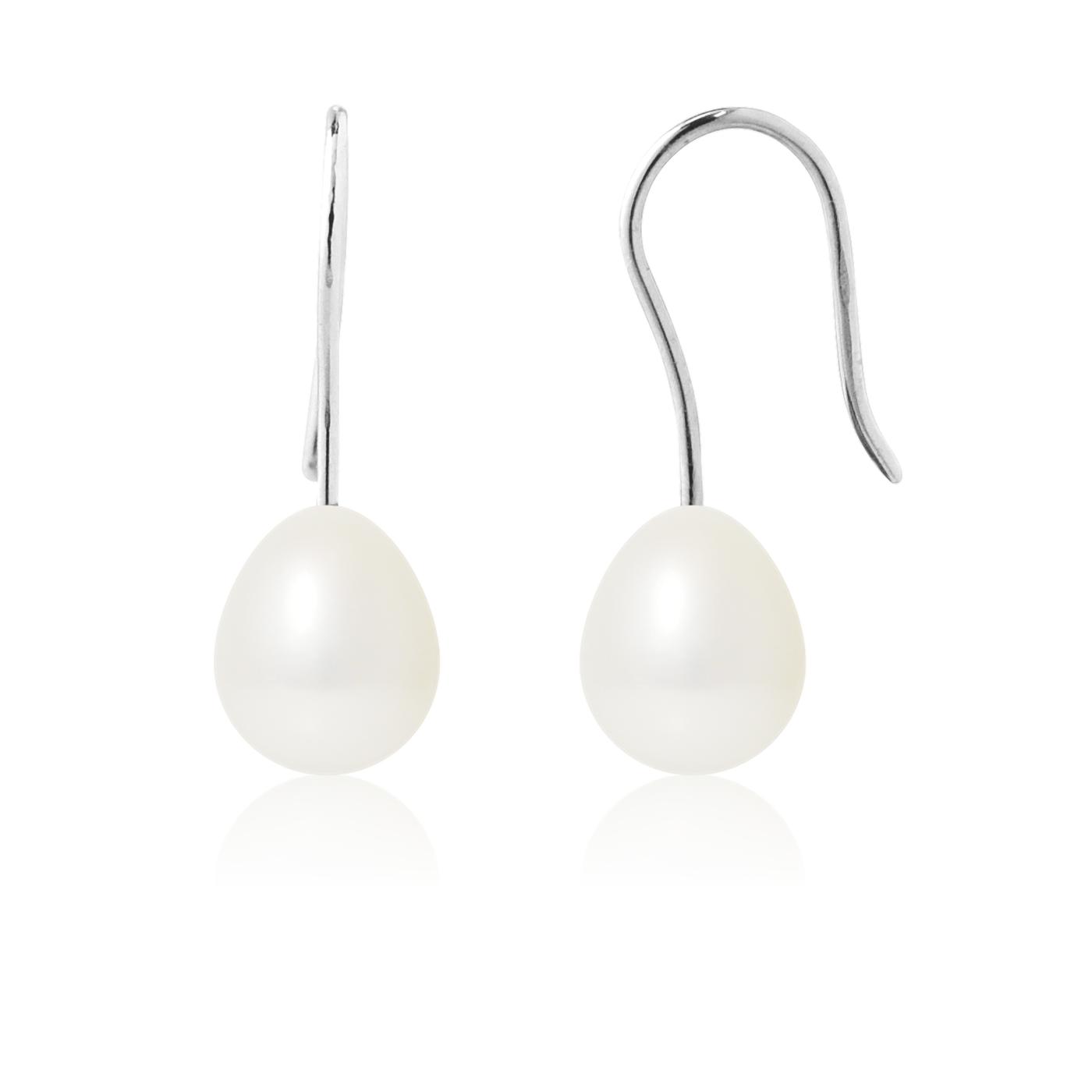 une paire de boucles d’oreilles en perles blanches