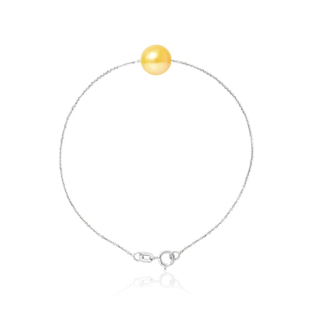 un bracelet de perles jaunes avec une chaîne en argent