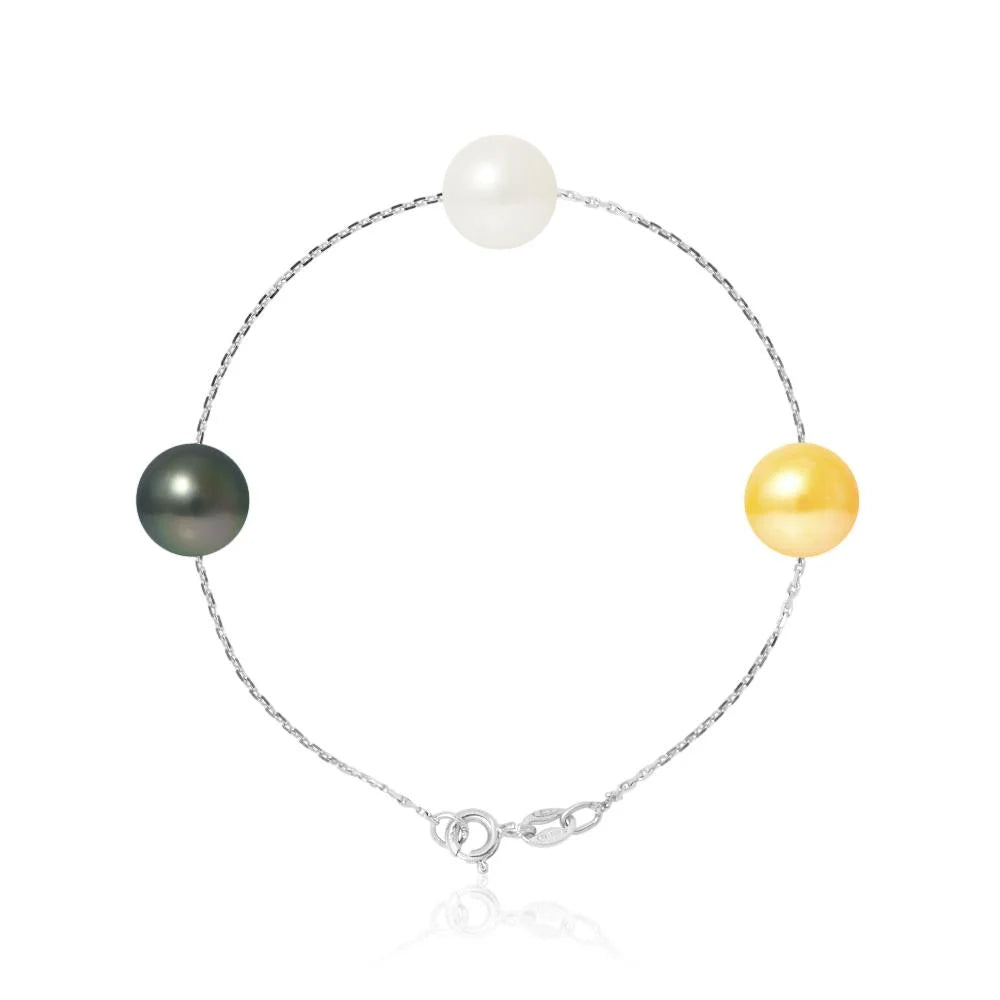un bracelet avec trois perles et une chaîne en argent