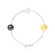 un bracelet avec trois perles et une chaîne en argent