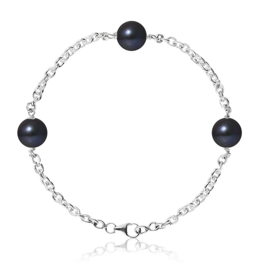 un bracelet avec des perles noires et une chaîne en argent