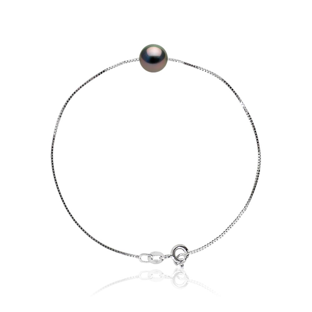 un bracelet en perles noires avec un fermoir en argent