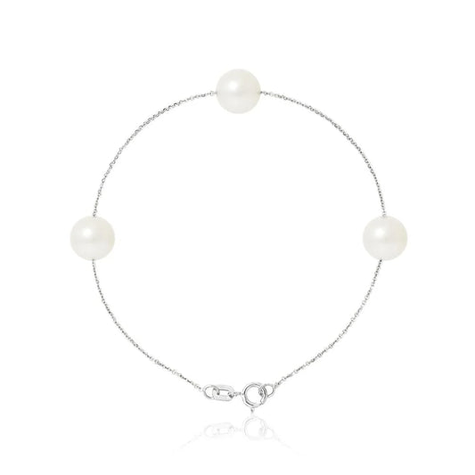 un bracelet en perles blanches avec un fermoir en argent