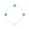 un bracelet avec des perles turquoises et une chaîne en argent