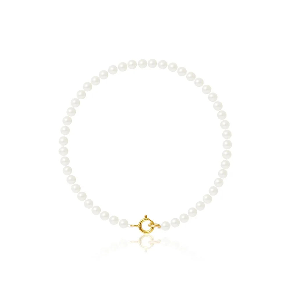 un bracelet de perles avec un fermoir en or