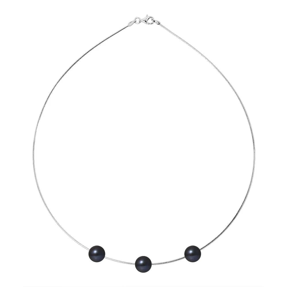 un collier avec deux perles noires sur une chaîne en argent