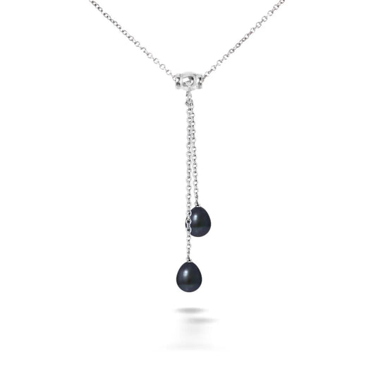 un pendentif en perles noires et diamants