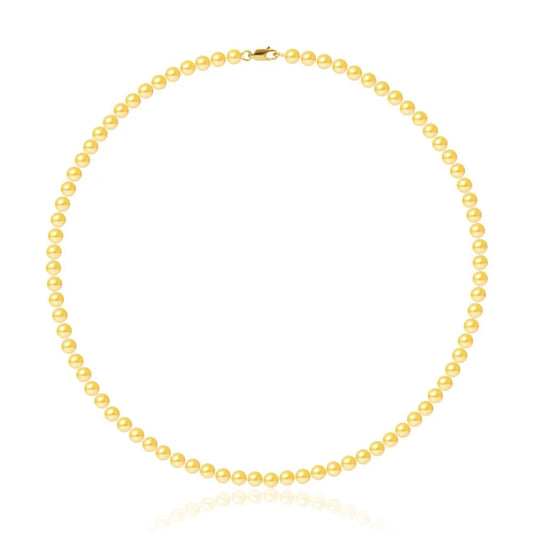 un collier de perles de culture
