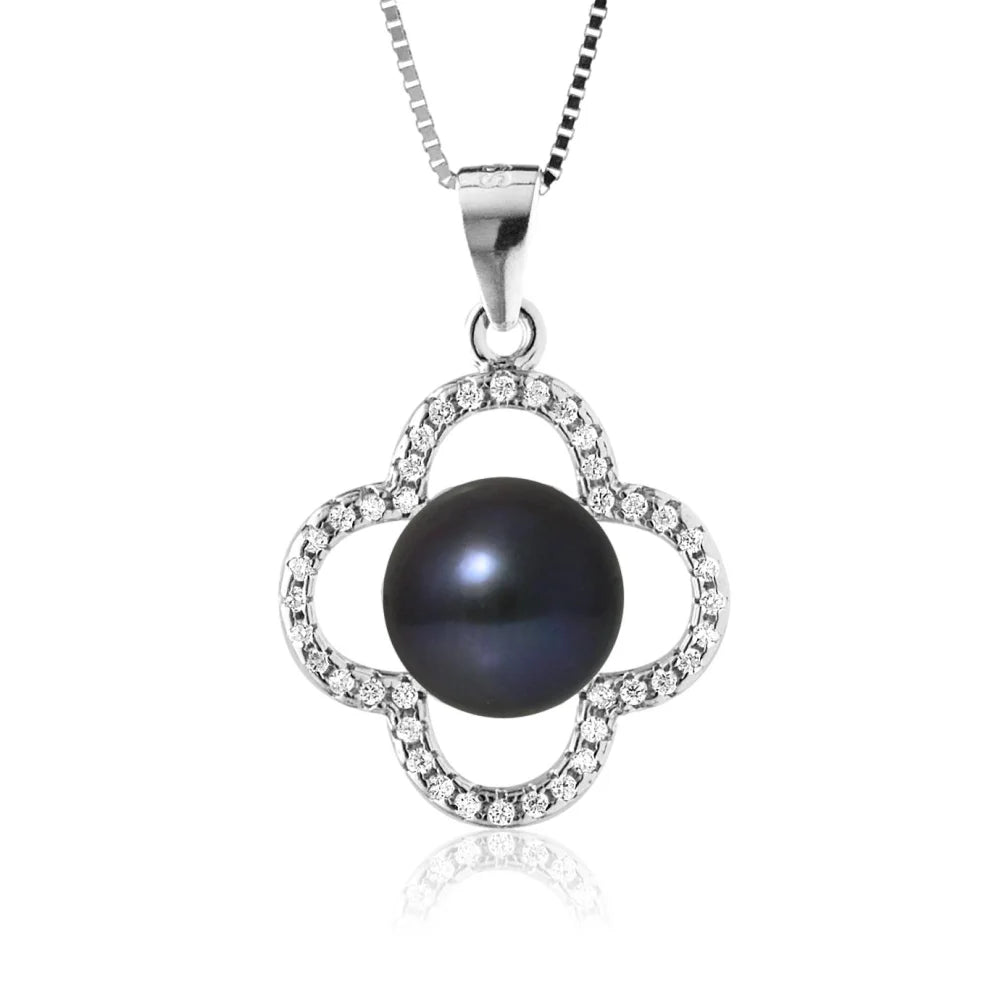 un pendentif en perles noires et diamants