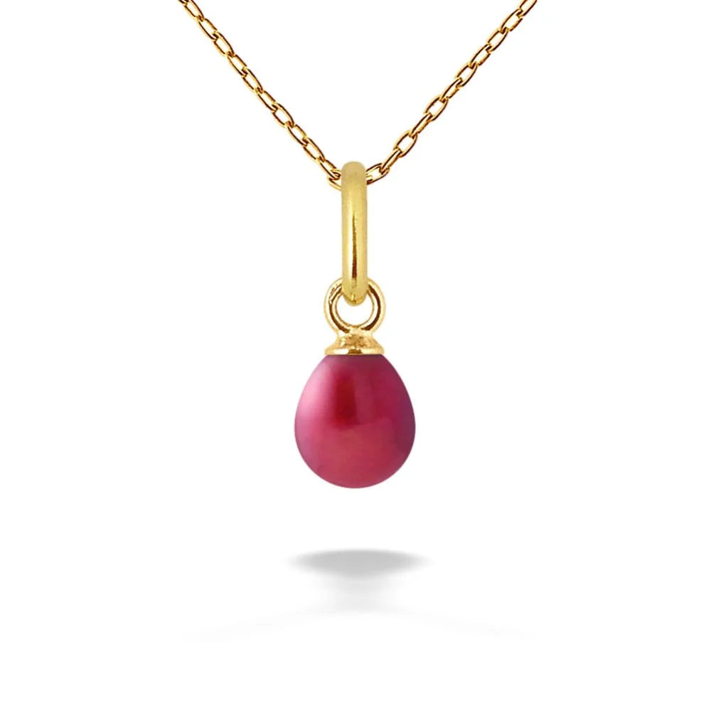 un collier en or avec une pierre rose