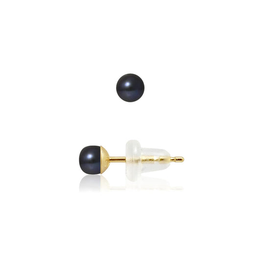 une paire de boucles d’oreilles en perles noires et or